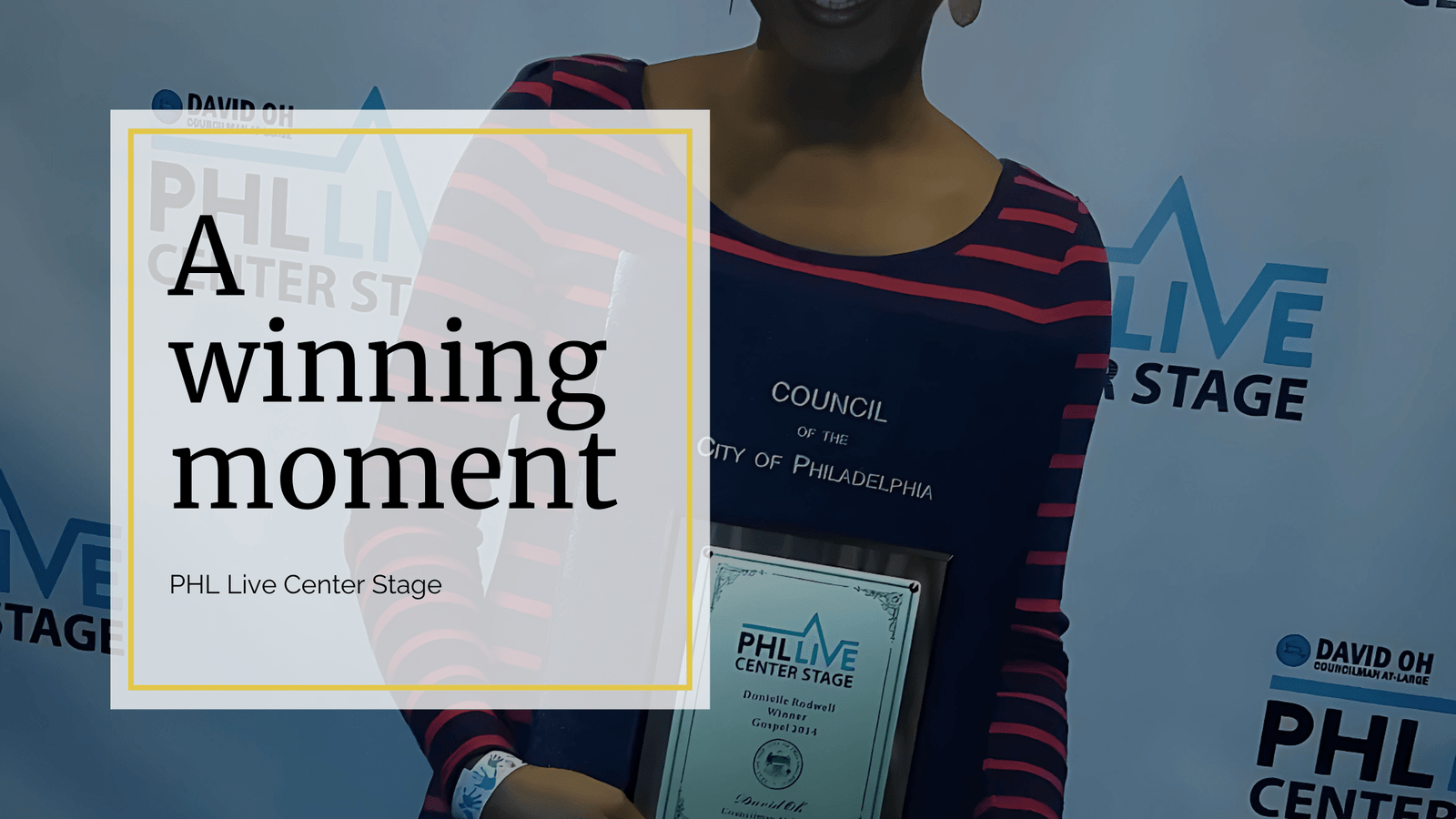 Donielle Rodwell at PHL Live Center Stage holding the award